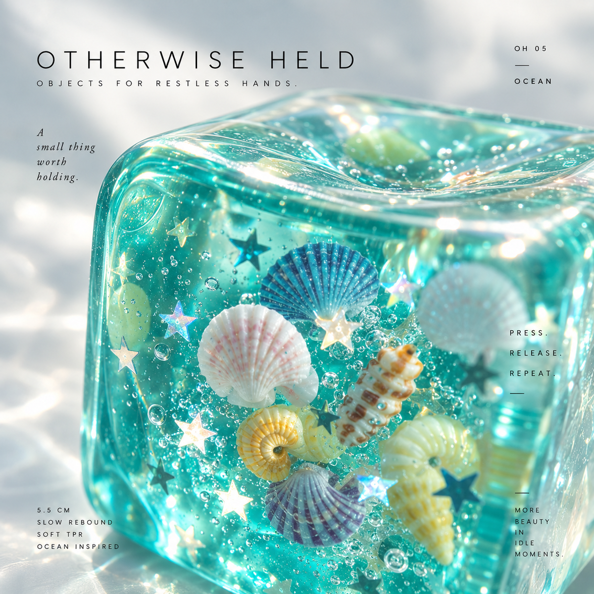 OH 05 Ocean, translucent teal squish cube with tiny shells and stars inside, on rippled light