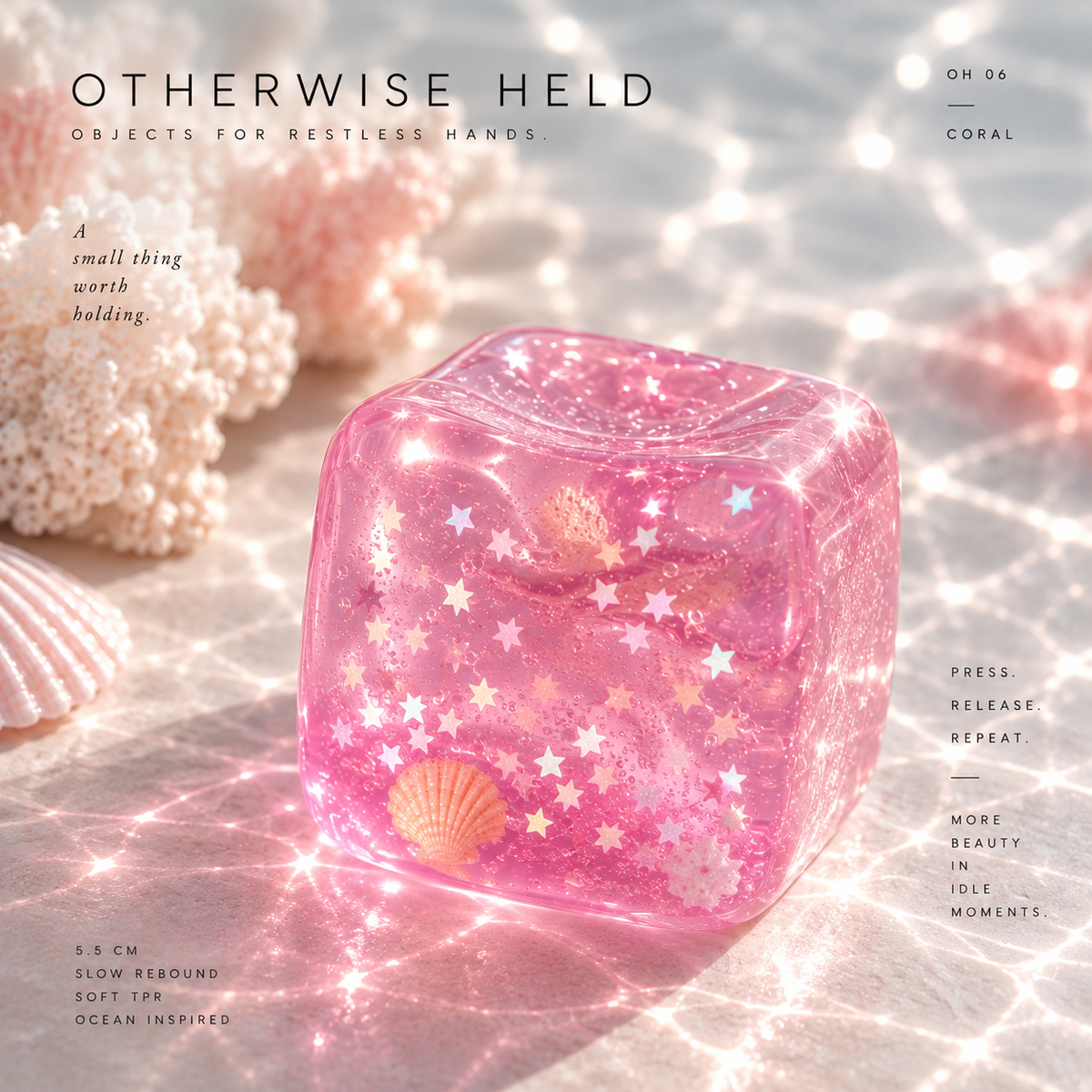 OH 06 Coral, translucent pink squish cube with stars and a shell inside, beside coral and seashells