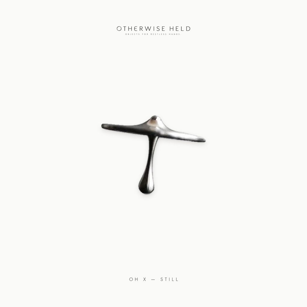 OH X Still water drop spinning top spinning on its own, minimalist metal fidget